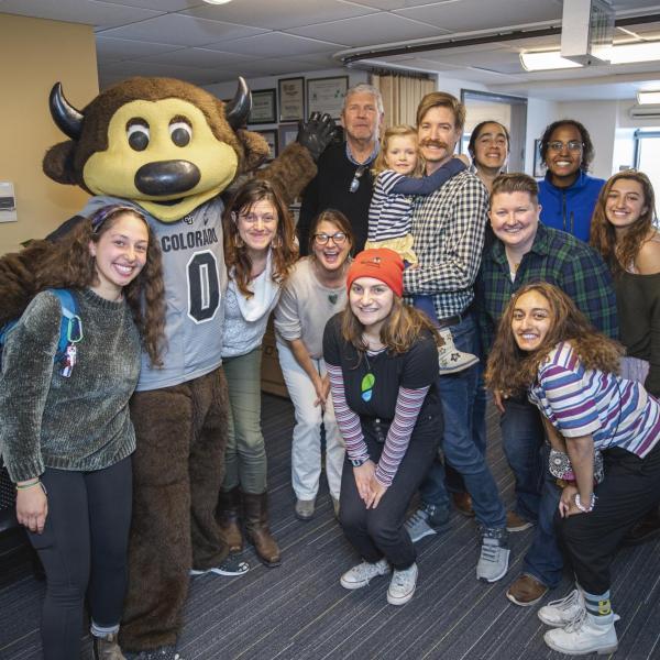 Chip visits Environmental Center staff to hand out gift bags and pose for pictures during Random Acts of Kindness Week