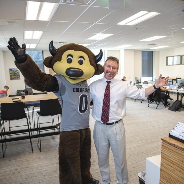 Chip visits Veteran and Military Affairs staff to hand out gift bags and pose for pictures during Random Acts of Kindness Week