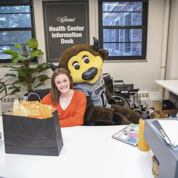 Chip visits Student Affairs staff to hand out gift bags and pose for pictures during Random Acts of Kindness Week