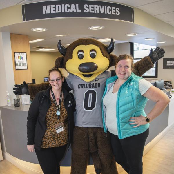 Chip visits Medical Services staff to hand out gift bags and pose for pictures during Random Acts of Kindness Week