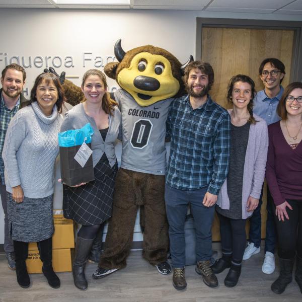 Chip visits Health Promotion staff to hand out gift bags and pose for pictures during Random Acts of Kindness Week
