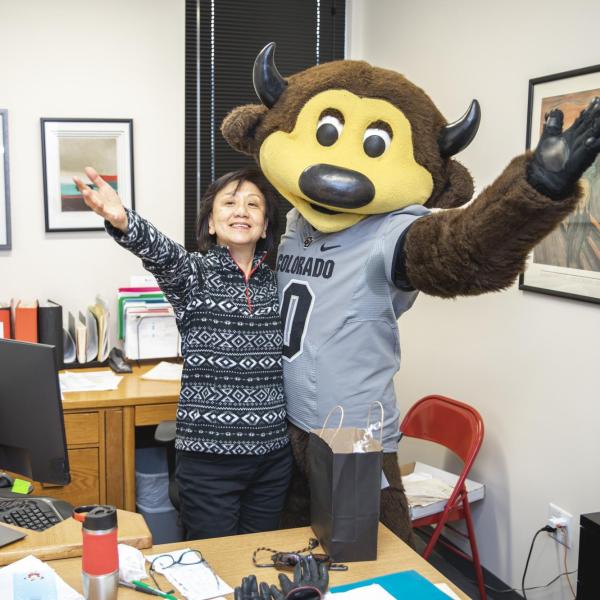 Chip visits Rec Center staff to hand out gift bags and pose for pictures during Random Acts of Kindness Week