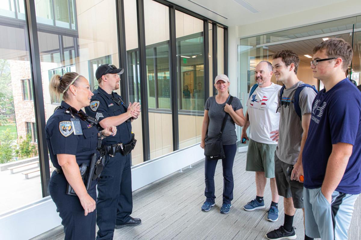 CUPD officers interacting with CU family