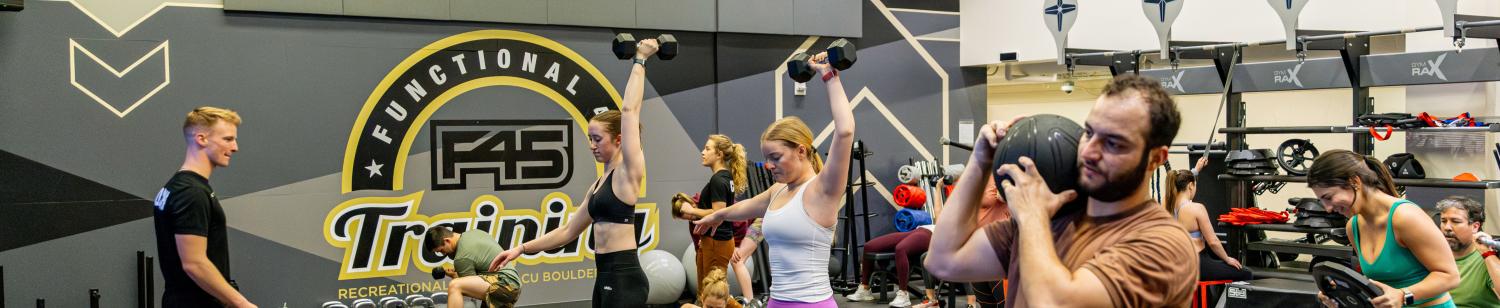 Students participate in a F45 fitness class at the Rec Center