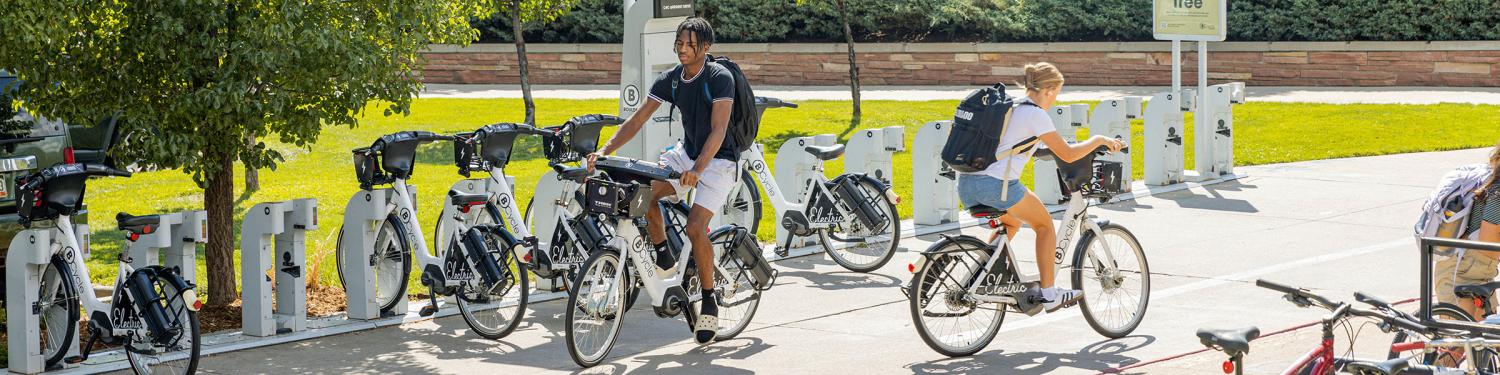 Students biking around campus