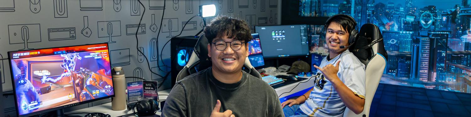 Two students in the UMC Gaming Lounge