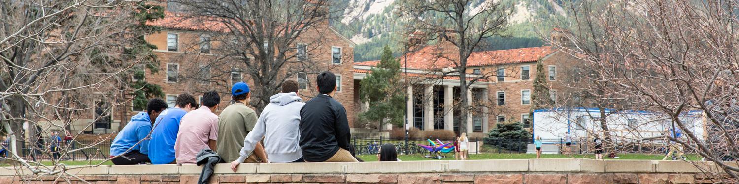 Students sitting on Farrand Field