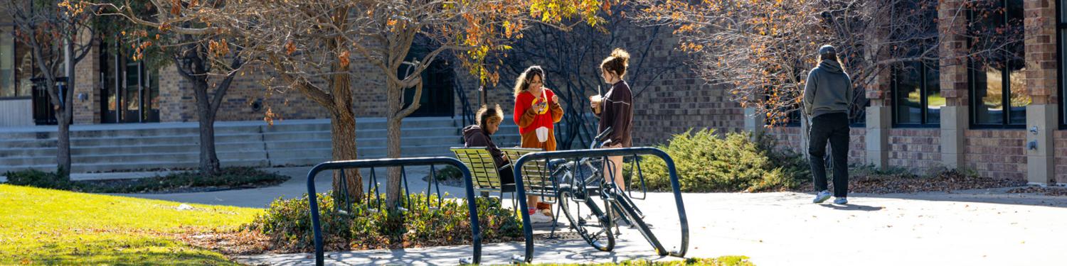 Students standing outside on campus