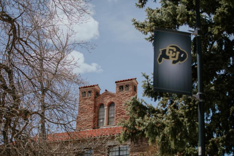 CU flag and Old Main