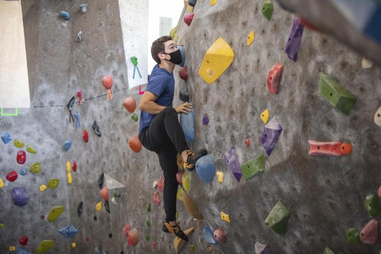 student climbing at rec center