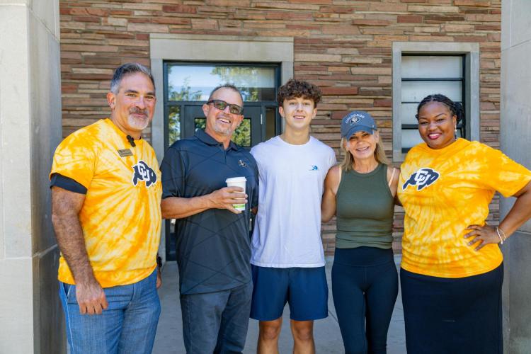 Dr Mull and Chancellor Justin with parents and students