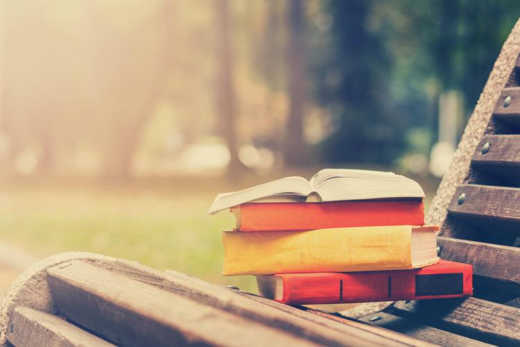 A stack of books on a chair
