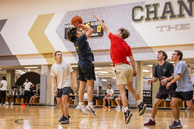 students playing basketball