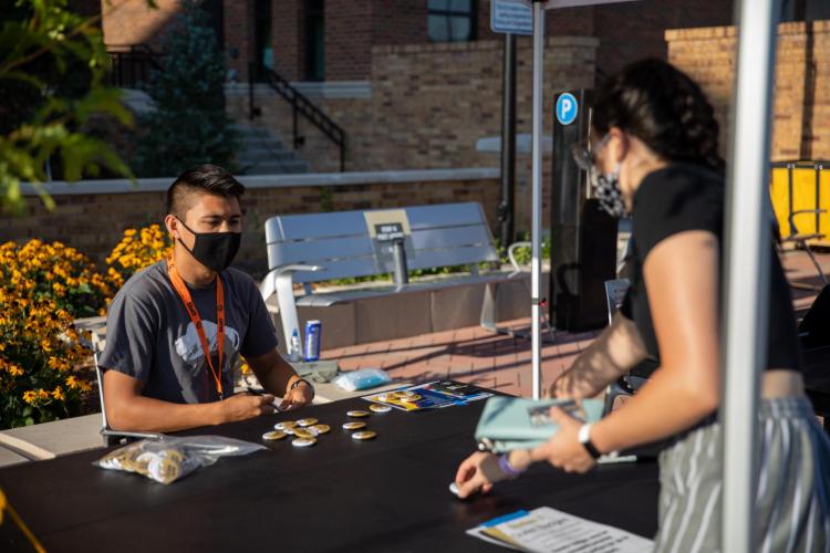 Student checking in for an event