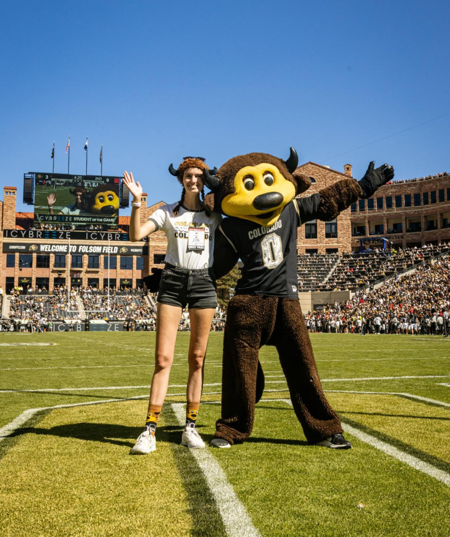 Student on Farrand Field with chip