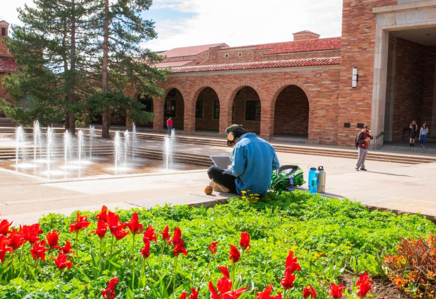 Student sitting outside