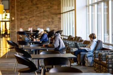 students studying at tables