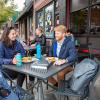 Students eat outside of the Sink restaurant
