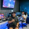 Two students in the UMC Gaming Lounge