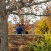A student sitting outside on campus