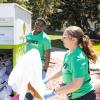 students helping sort move-out trash