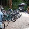 Student on campus with a bike