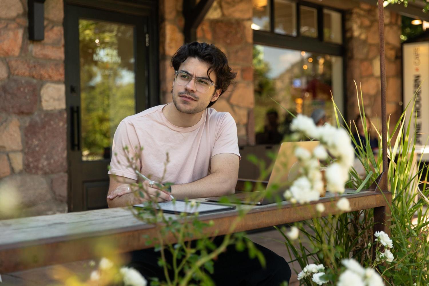 Photo of student sitting at table
