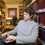 Summer Session student, Chase Pennoyer in the Nolan Library