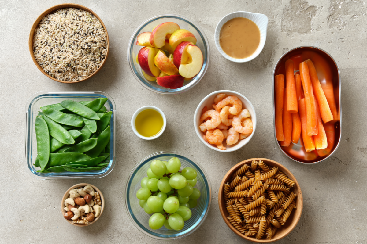 A variety of foods portioned in bowls