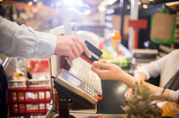 Man paying with credit card