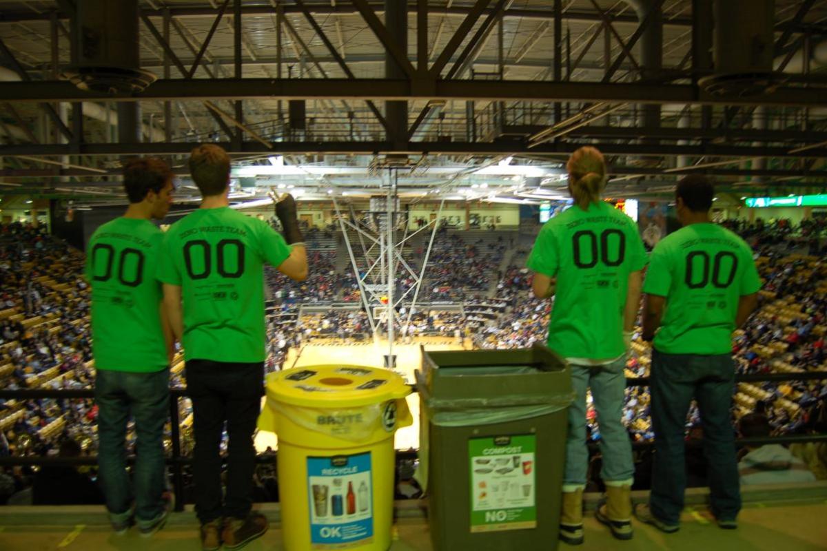 Ralphie's Green Stampede student volunteers at a CU basketball game.