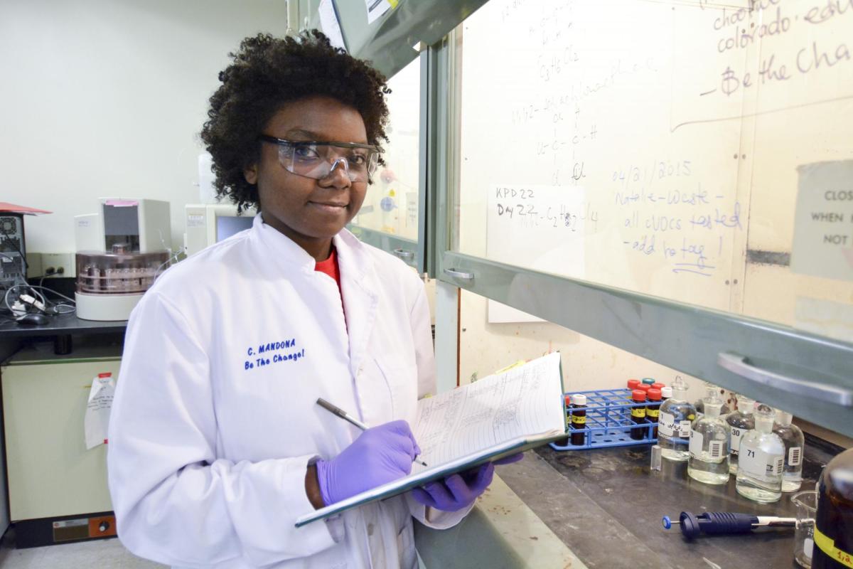 Female student working in a lab.