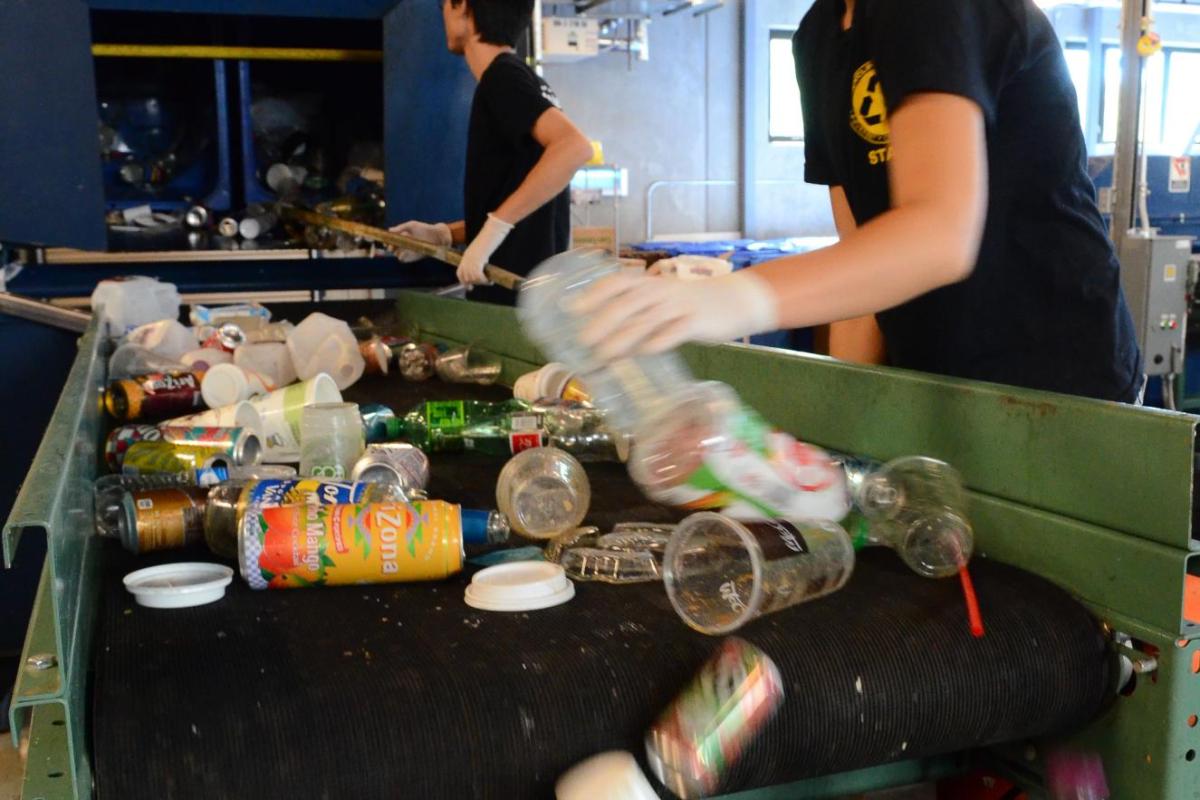 Student working in the Recycling Center