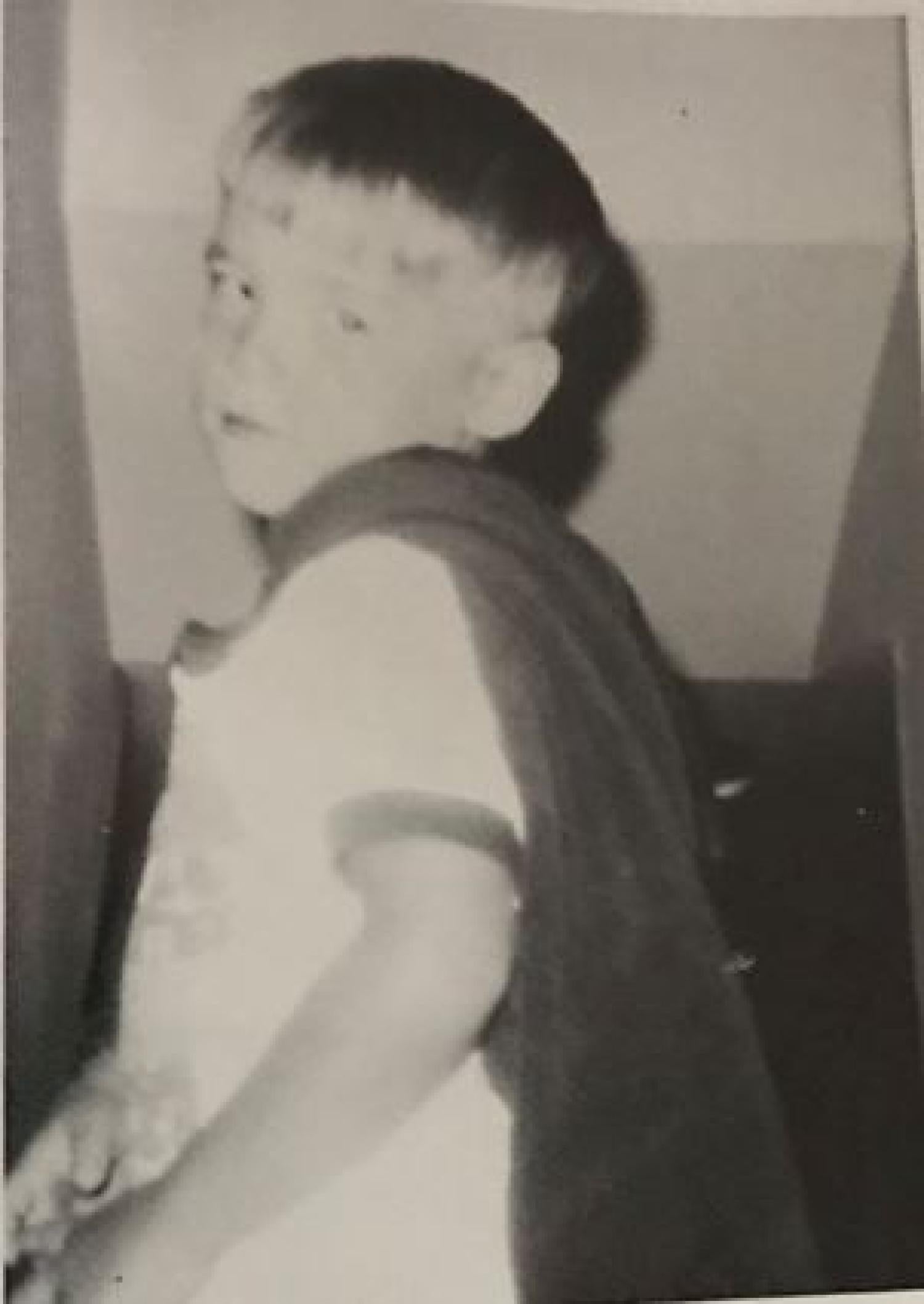 Pat as a kid dressed as a superhero