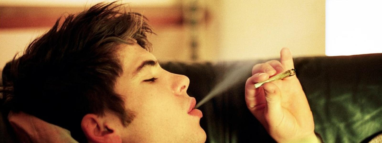 Teen smoking marijuana