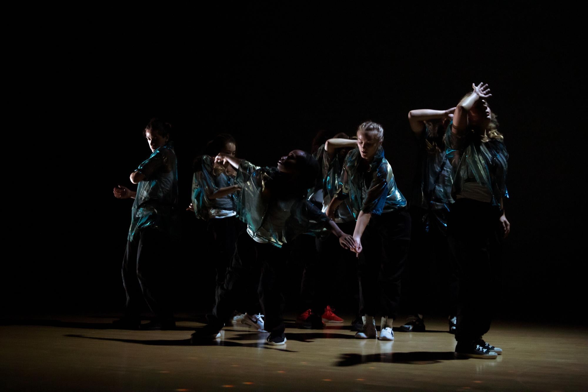 several students perform a hip-hop piece