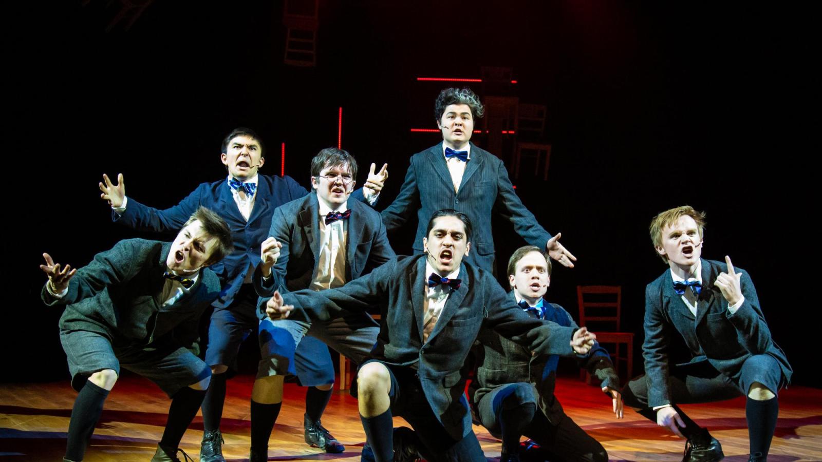 several students perform Spring Awakening