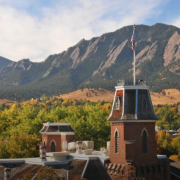 Old Main with Flatirons in the background