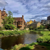 Photo of river and buildings in Scotland