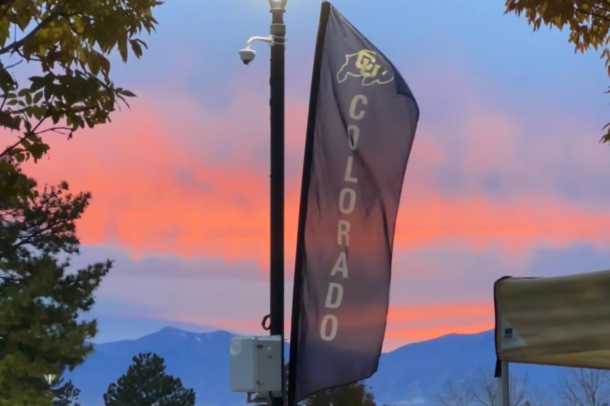 CU buffs flag in front of sunset
