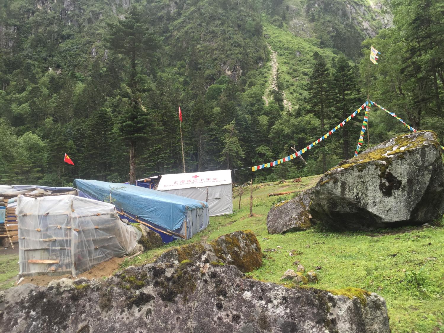 A rest stop along the way, including a rudimentary medicine dispensary (given out by a 	Tibetan from a local village with no medical training) in a Chinese Red Cross tent of unknown origin.