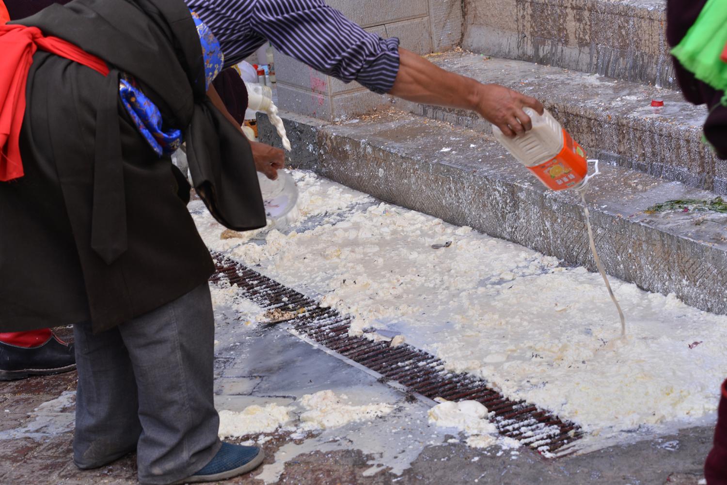 Alcohol and yoghurt are poured as propitiations.