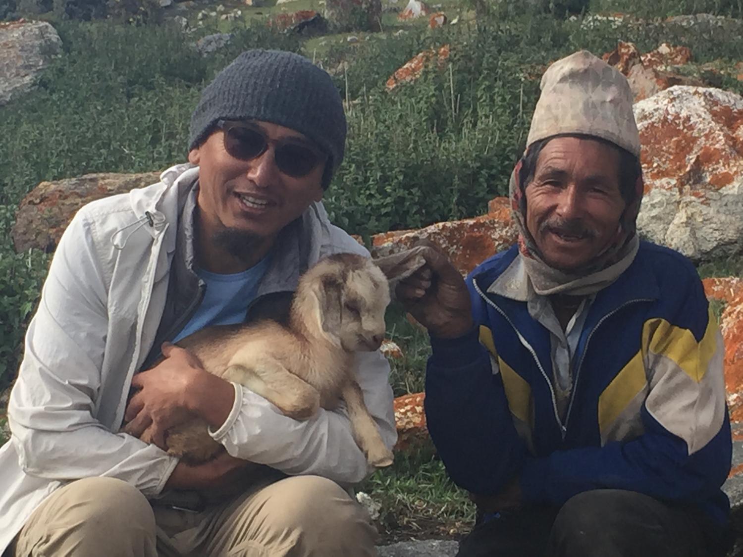 Ashok, herder, and baby goat