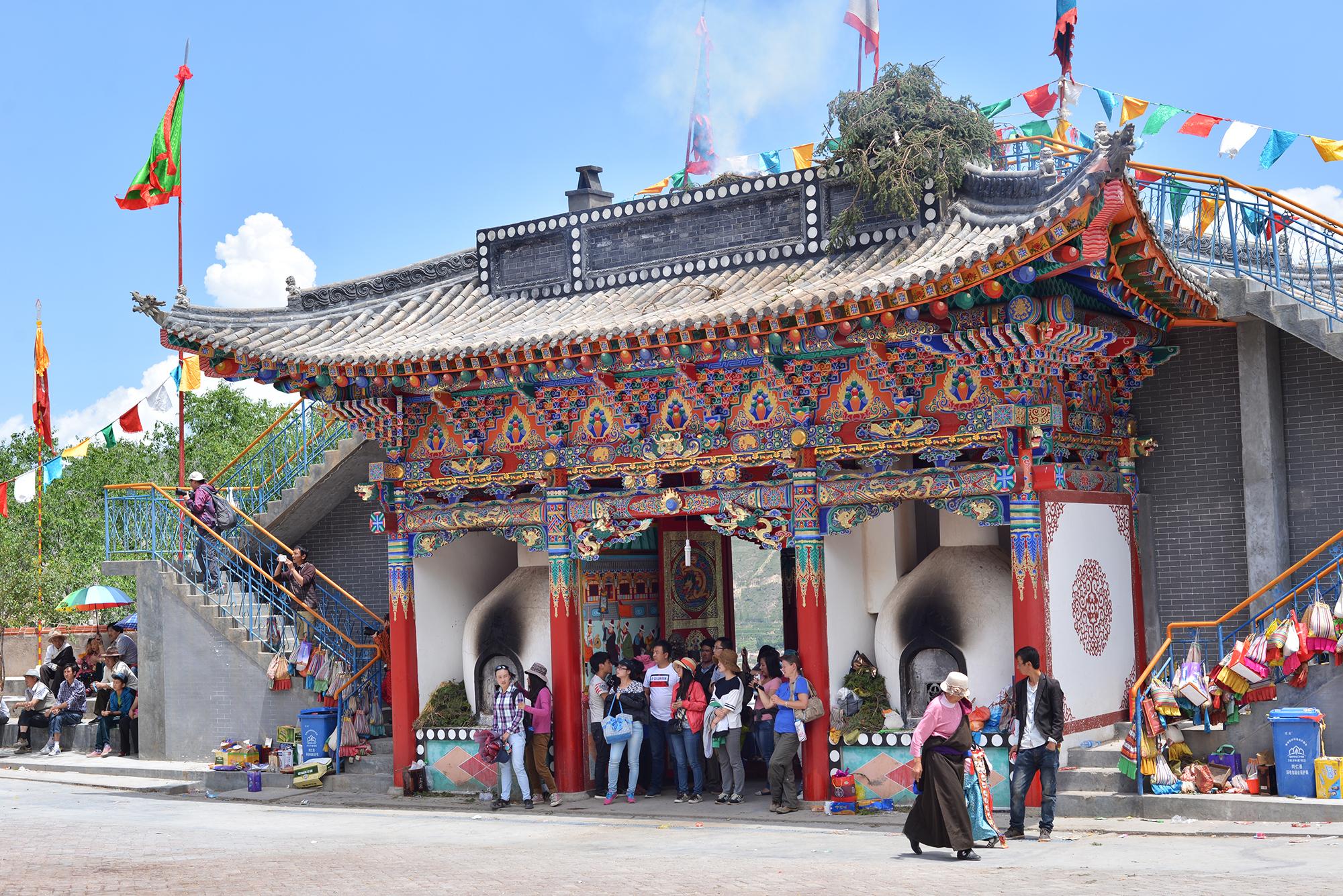 Between 2010 and 2014 the offering altar was rebuilt to be significantly larger. Just seven years ago, the grounds for the festival were much smaller and many fewer tourists came to see it. Because of improvements to roads, more tourists are now able to enter the city. Information about important festival dates can also be easily shared over social media. (Photo taken 2014)