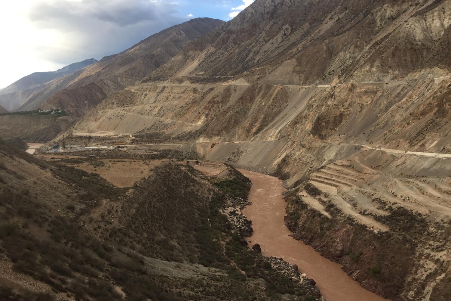 Road construction and erosion along the banks of the Mekong.