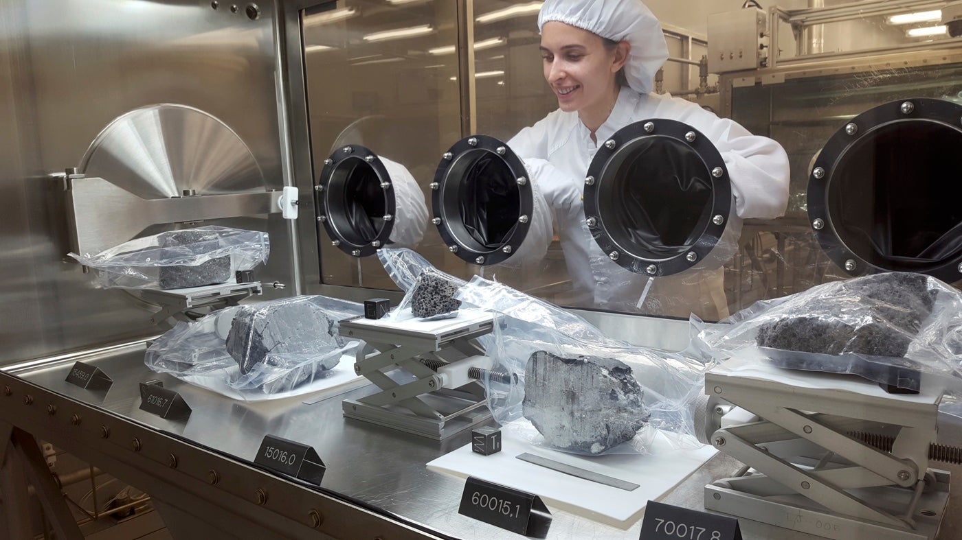 Geologist Carolyn Crow investigating moon rocks at NASA's Johnson Space Center in Houston.