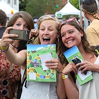 Students taking selfie photo at Grad Bash