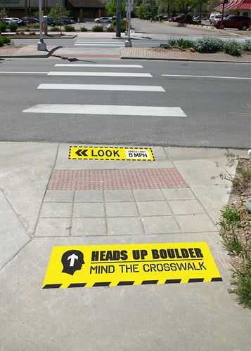 Heads Up Boulder crosswalk safety campaign signs