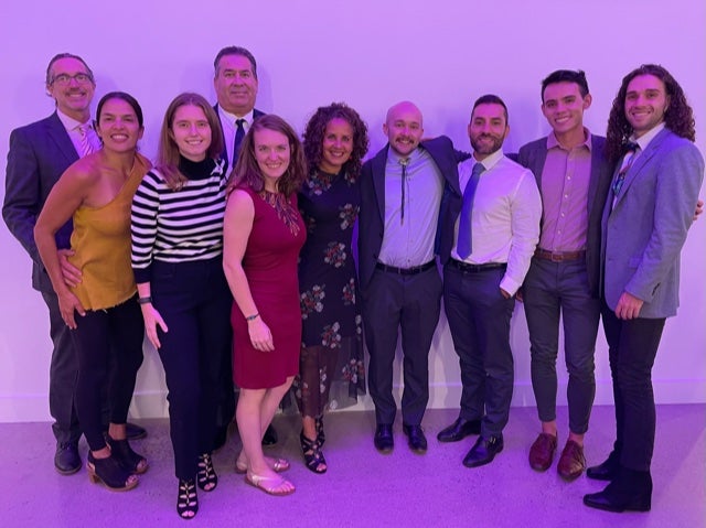 Suzette Malveaux pictured with various Colorado Law students and faculty