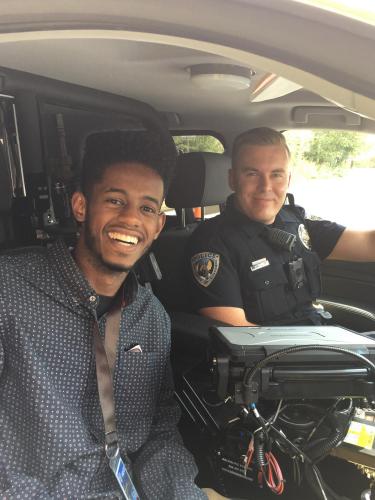 CORB member Jemil Kassahun participates in a ride-along with CUPD Officer Ryley Davis